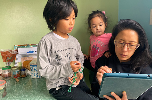 Family looking at screen.