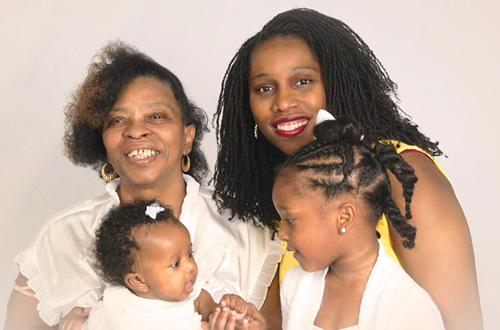 Irella with her children and her mother, Bertha Mae Cooper.