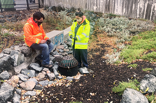 Tim Paez setting up a testing site with a colleague.