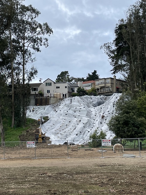 Photo showing slope covered in plastic