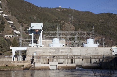 Moccasin Powehouse with penstocks in the background