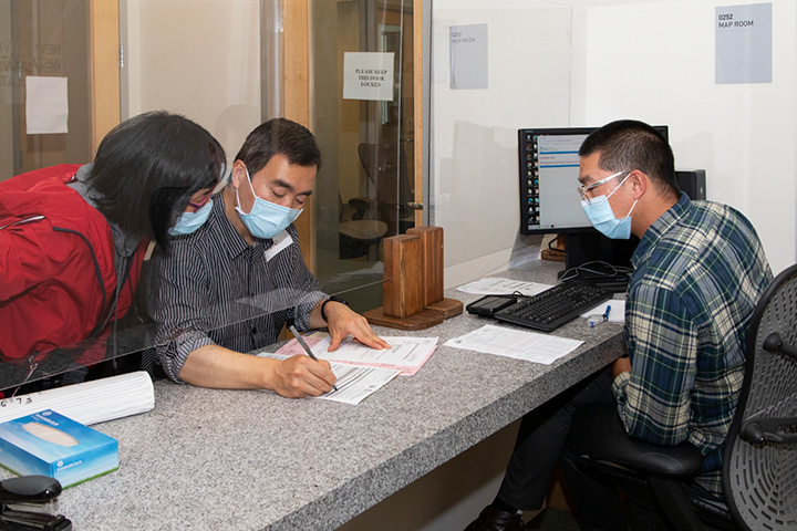 Customer Service Rep working with a customer.