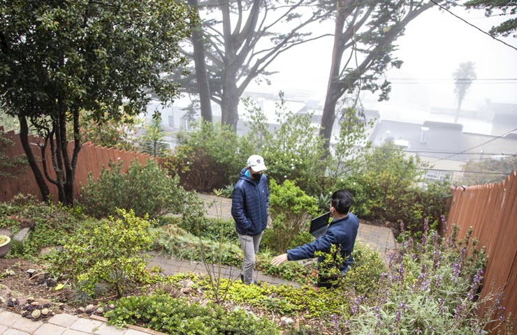 SFPUC employee provides a water wise evaluation for a customer