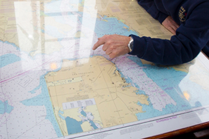 Man points at spot on map of Hetch Hetchy water system