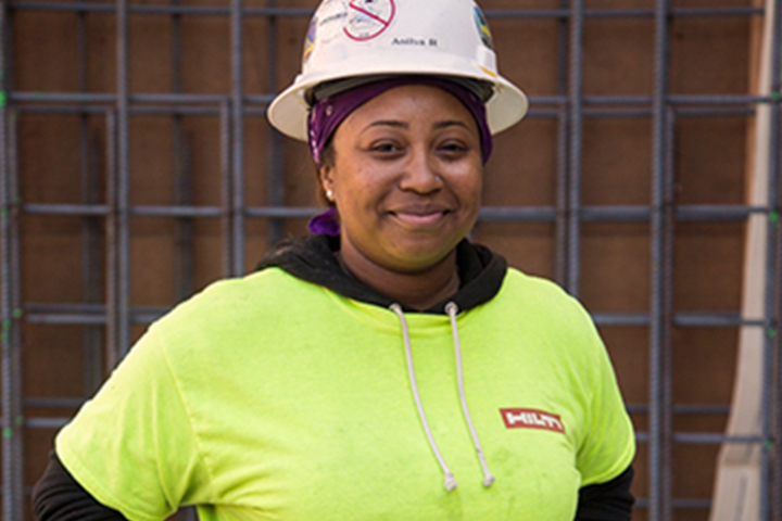 Female apprentice at the job site.