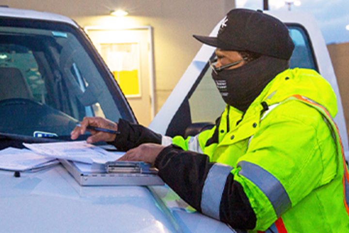 SFPUC employee filling out paperwork