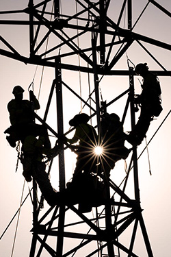 SFPUC crews upgrade Hetch Hetchy Power Transmission lines in the Central Valley in August 2023. The SFPUC is investing further to upgrade and expand clean power infrastructure.