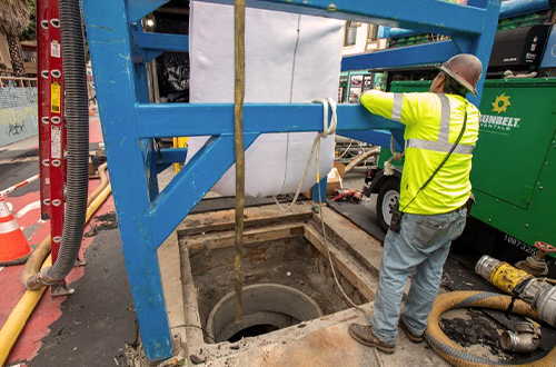 A manhole during the Cured-in-Place Pipe (CIPP) process