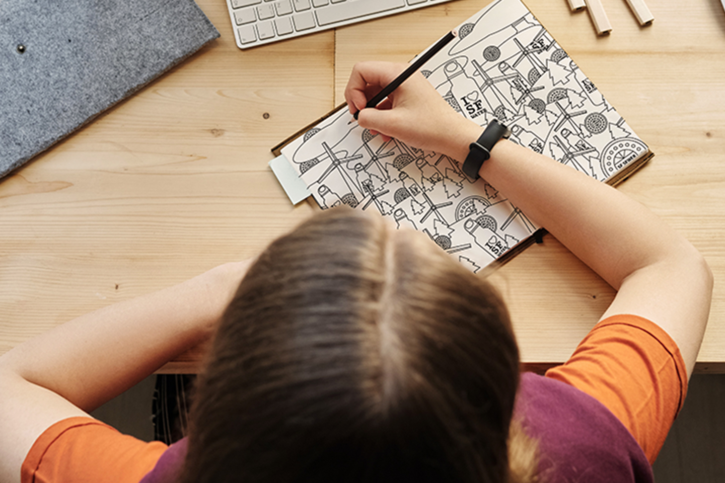 Child playing with a puzzle on the table