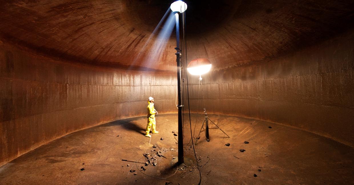 Underground, an engineer inspects the interior of an existing cistern on 25th St. and San Bruno Avenue.  