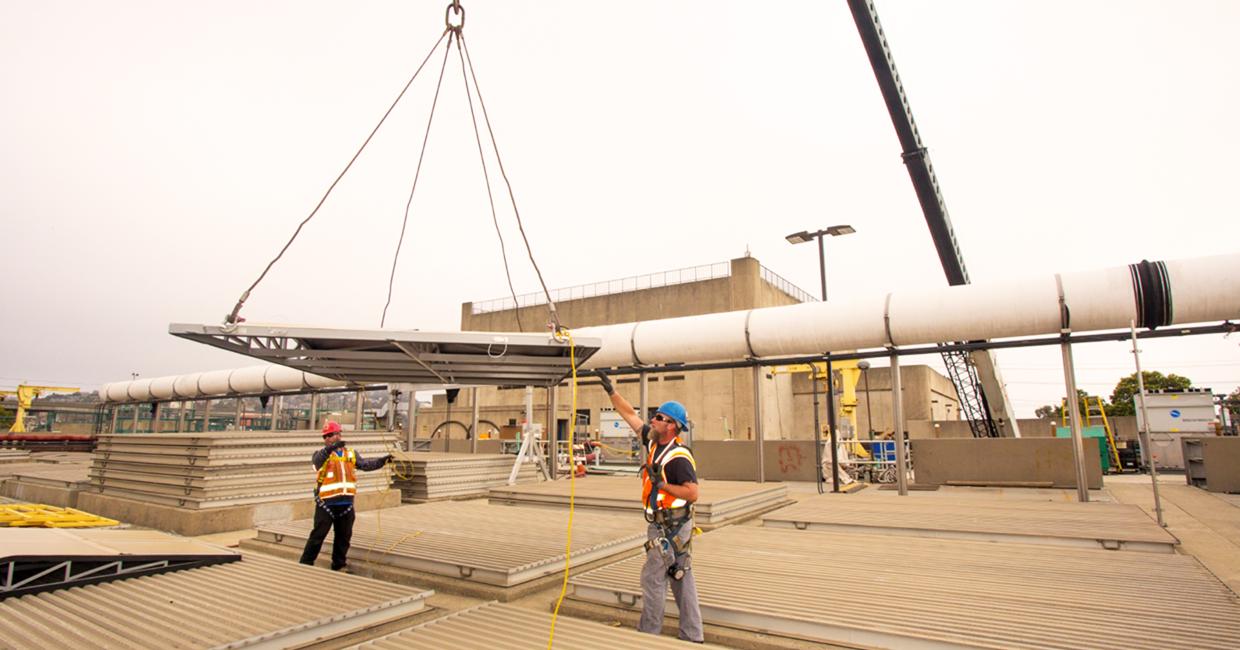 SFPUC staff lays pipe in place for key seismic retrofit.