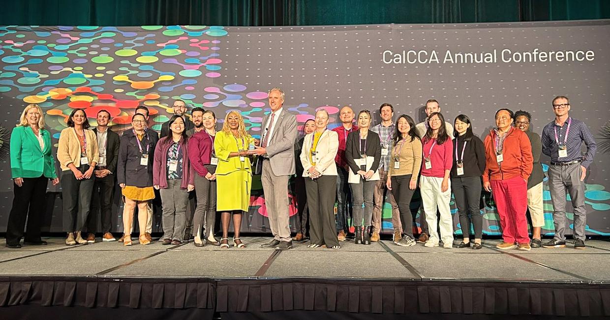 The CleanPowerSF team accepting the Community Impact Award at the California Community Choice Association's annual conference. 