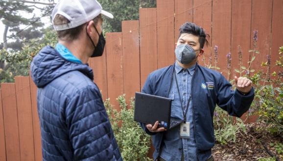 Water Wise Evaluation: Homeowner Peter Monks, left, receives a water wise evaluation from Andrew Ho, right, a Water Service Technician at the San Francisco Public Utilities Commission.