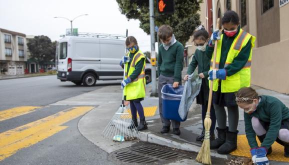 St. Johns Academy students clearing adopted drain