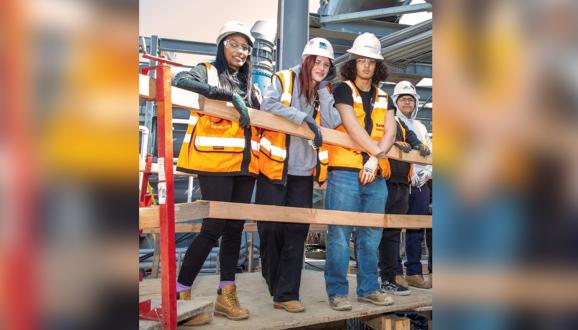 From left to right, John O’Connell High School Teacher Tia Walme and students: Sydney Lange, James O’Brien, and Felipe Montoya Perez.