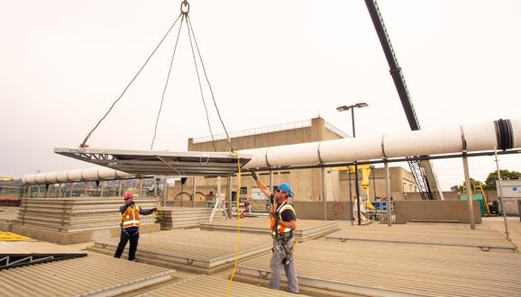 SFPUC staff lays pipe in place for key seismic retrofit.