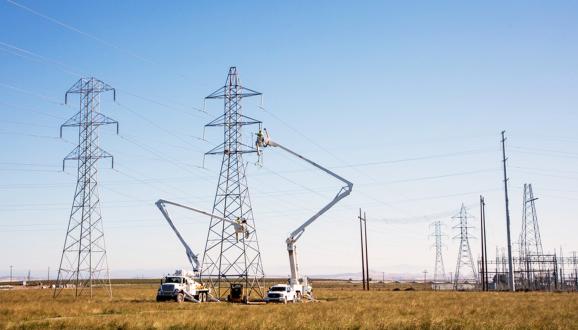 SFPUC crew members working on transmission lines.
